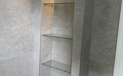 Compact landing bathroom with bespoke feature shelving